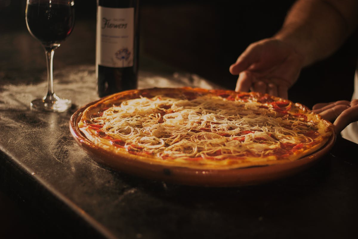 la cipolla sulla pizza si mette cruda o cotta